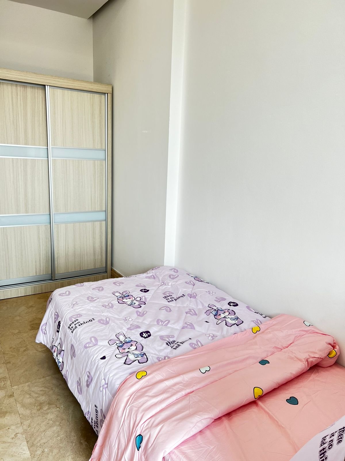 Room 501 — single bed and sliding wardrobe