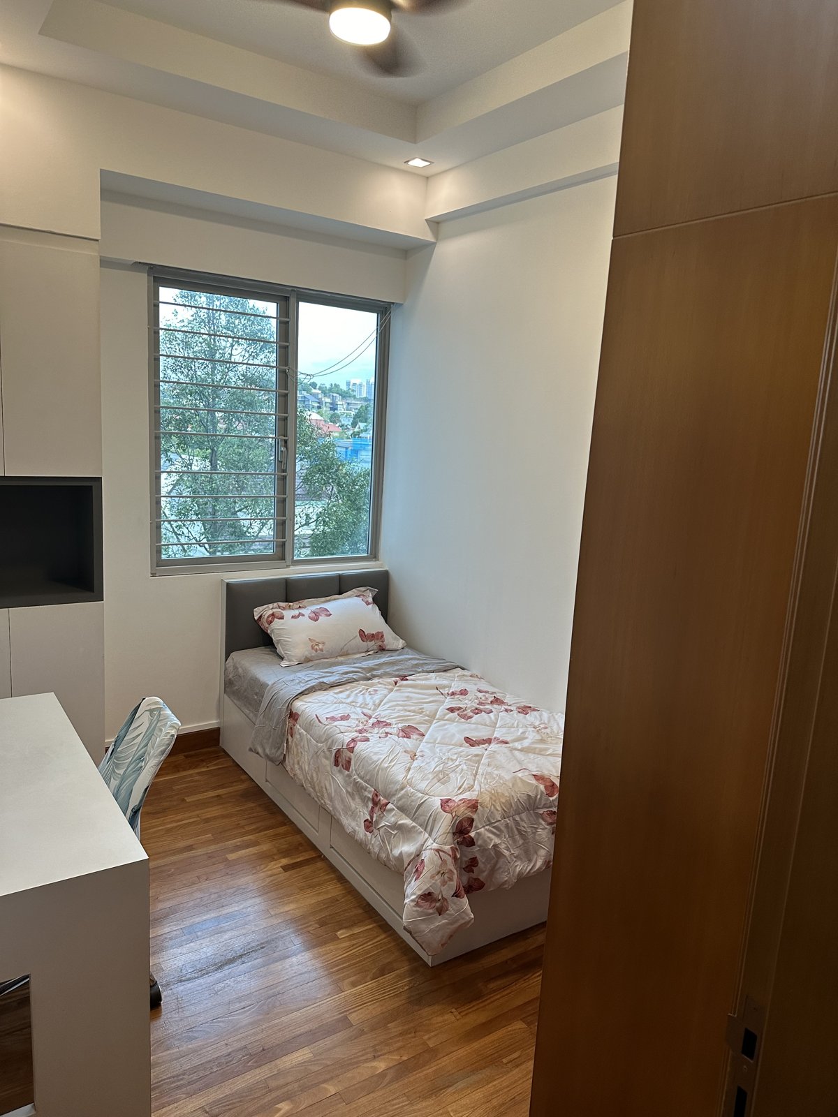 Room 503 — single bed, desk and window