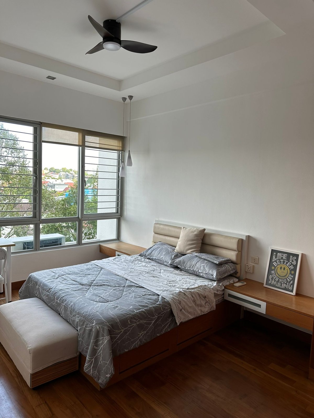 Room 505 — double bed with window and ceiling fan