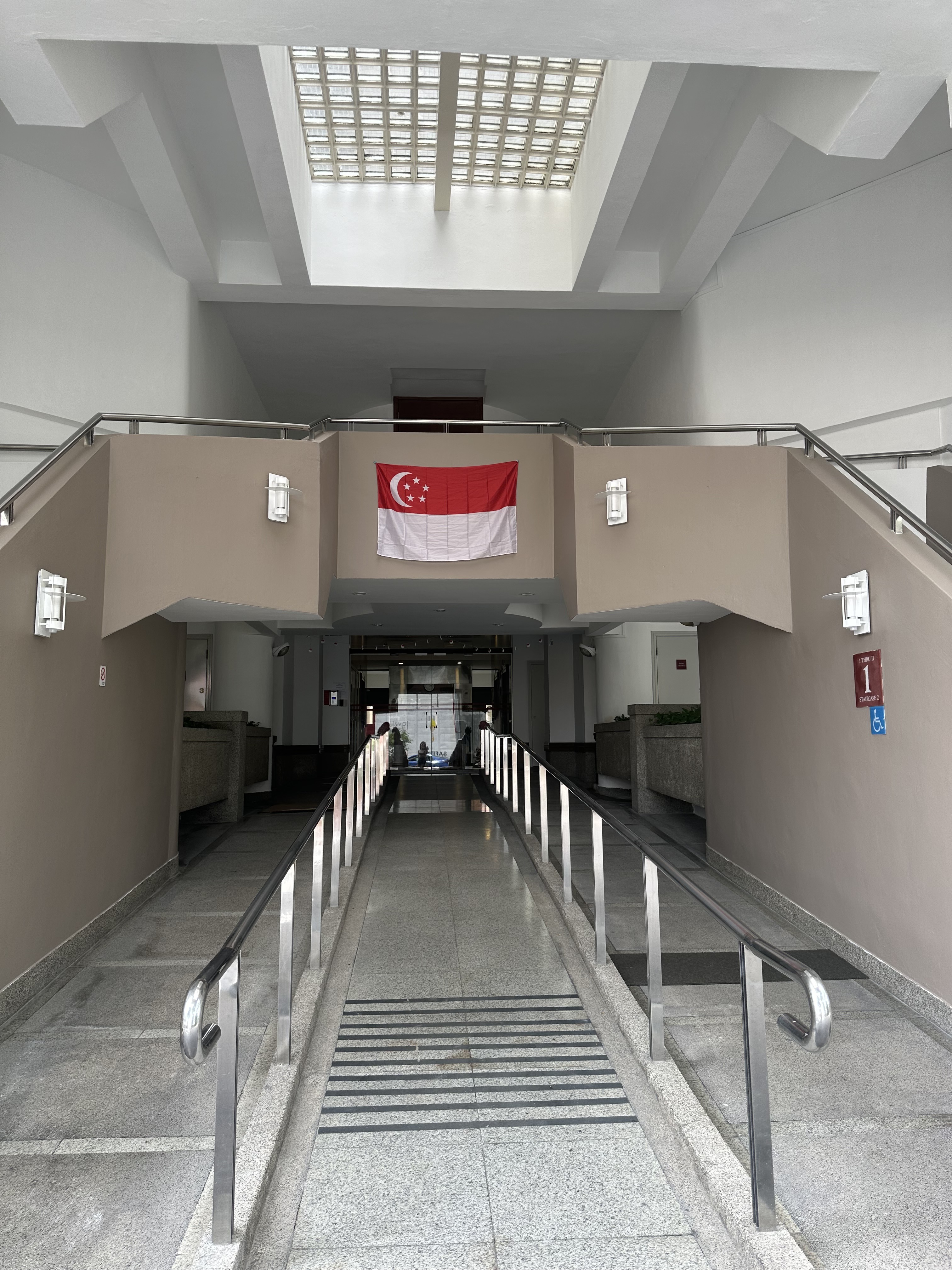 Harvest Mansions — lobby entrance with ramp and staircase